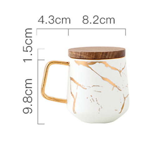 Gold painted ceramic mug