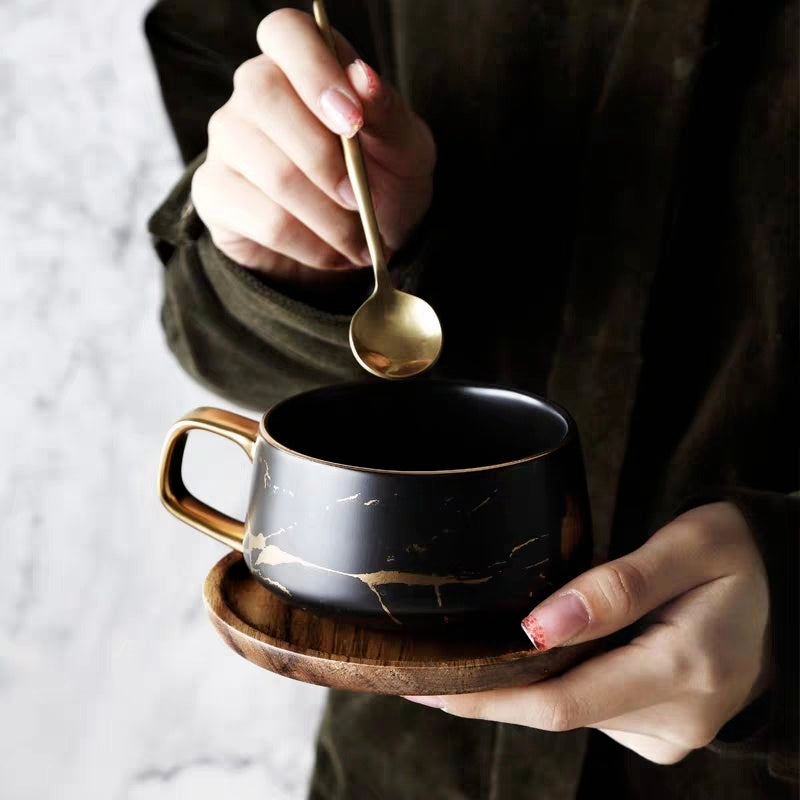 Gold painted ceramic mug