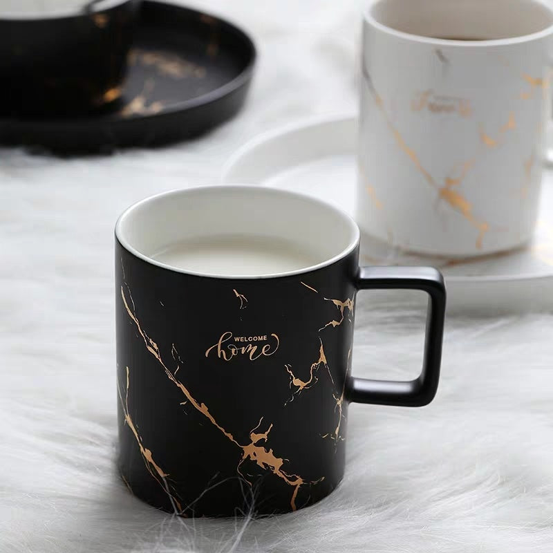 Gold painted ceramic mug