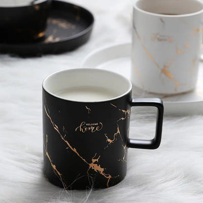 Gold painted ceramic mug
